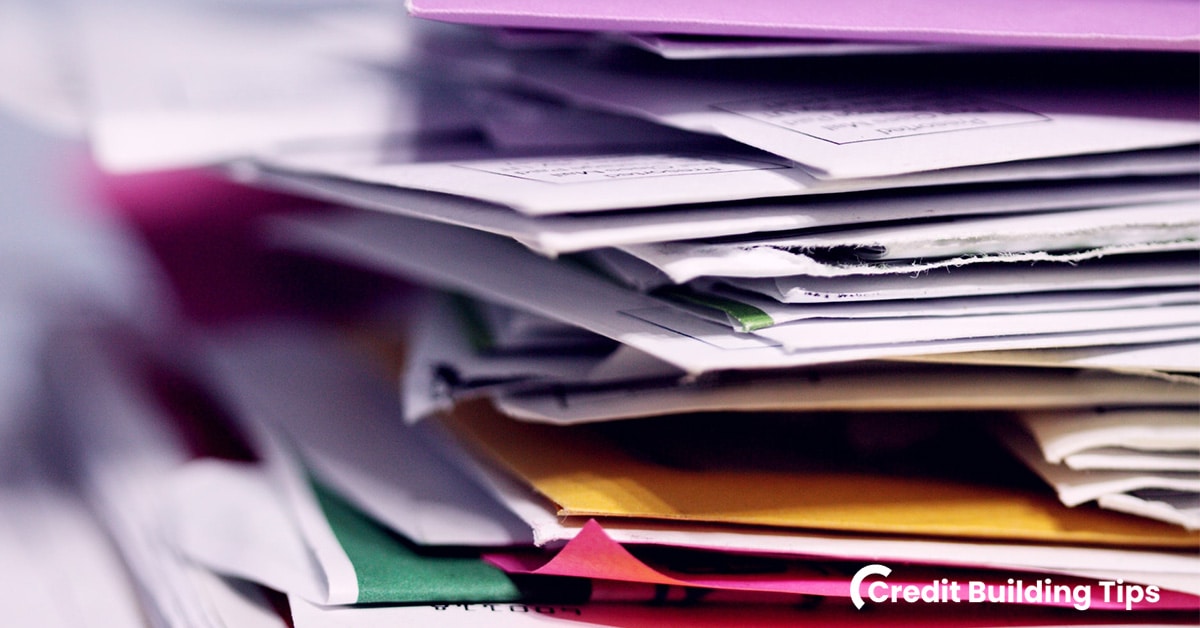 stack of unpaid bills pay for delete collections